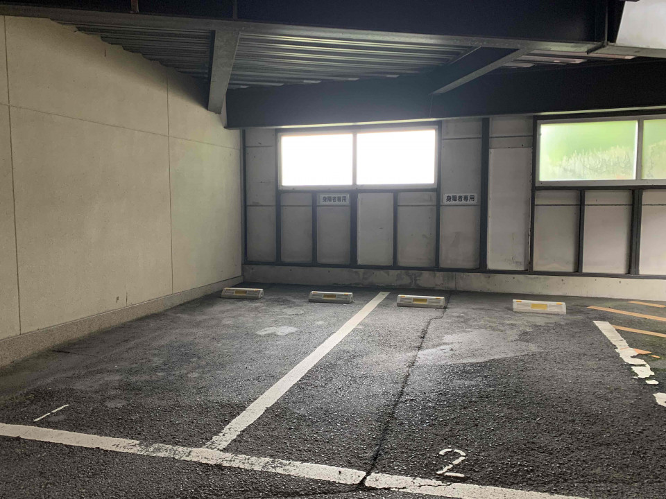 Interior of the Nakanohashi Bridge parking lot with accessible parking.